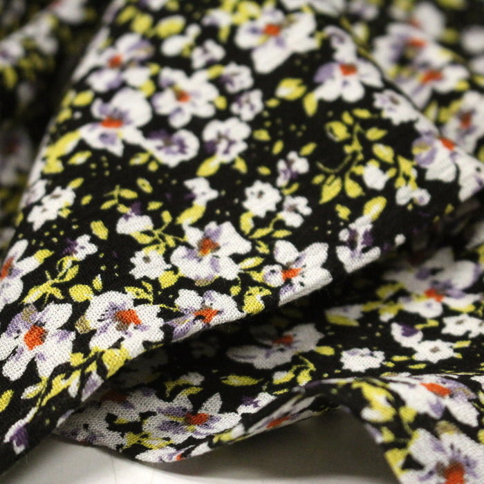 Tissu Viscose crêpe noir fleuri jaune blanc violet orange - TissusPapi.com