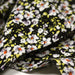 Tissu Viscose crêpe noir fleuri jaune blanc violet orange - TissusPapi.com