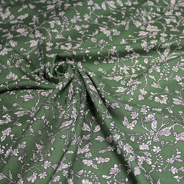Tissu viscose fluide, fines fleurs blanches et noirs, fond ocre ou fond vert