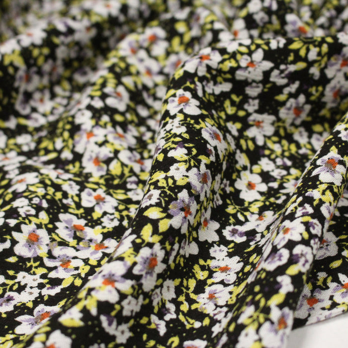 Tissu Viscose crêpe noir fleuri jaune blanc violet orange - TissusPapi.com