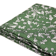 Tissu viscose fluide, fines fleurs blanches et noirs, fond ocre ou fond vert - TissusPapi.com