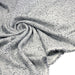 Tissu Tweed coton laine faux-uni blanc gris, taches noires - Fabrication française - TissusPapi.com