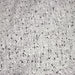Tissu Tweed coton laine faux-uni blanc gris, taches noires - Fabrication française - TissusPapi.com