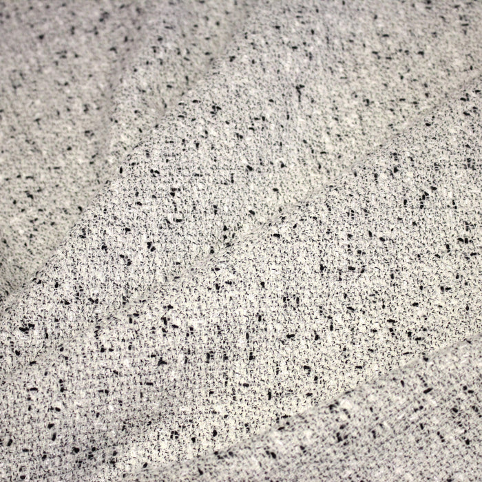 Tissu Tweed coton laine faux-uni blanc gris, taches noires - Fabrication française - TissusPapi.com