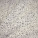 Tissu Tweed coton laine faux-uni blanc gris, taches noires - Fabrication française - TissusPapi.com