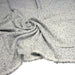 Tissu Tweed coton laine faux-uni blanc gris, taches noires - Fabrication française - TissusPapi.com