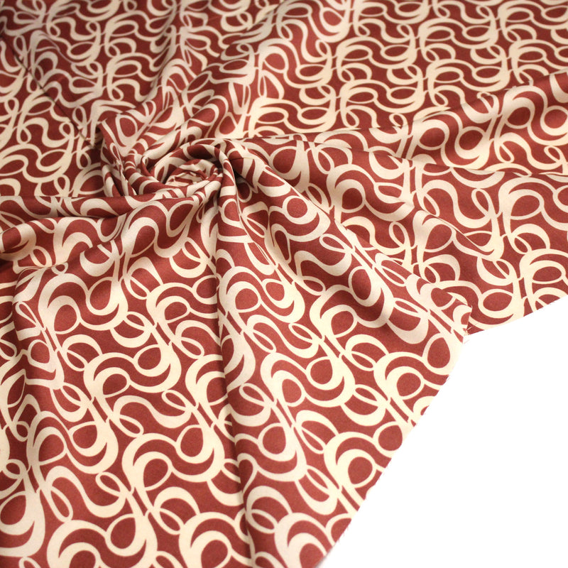 Tissu viscose fluide, motifs et cercles géométriques écrus, fond terre de sienne - TissusPapi.com