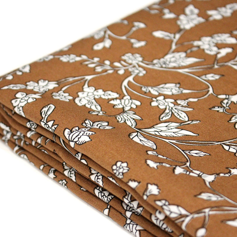 Tissu viscose fluide, fines fleurs blanches et noirs, fond ocre ou fond vert - TissusPapi.com