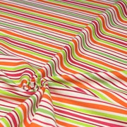 Tissu Bayadère de coton aux rayures oranges, rouges et roses, fond blanc - TissusPapi.com