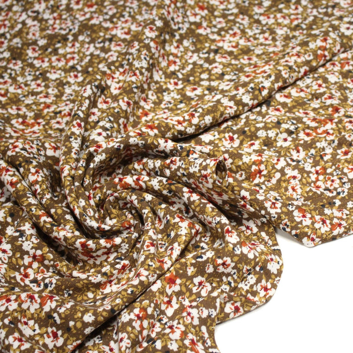 Tissu Viscose crêpe ocre fleuri blanc rouille noir - TissusPapi.com