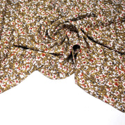 Tissu Viscose crêpe ocre fleuri blanc rouille noir - TissusPapi.com