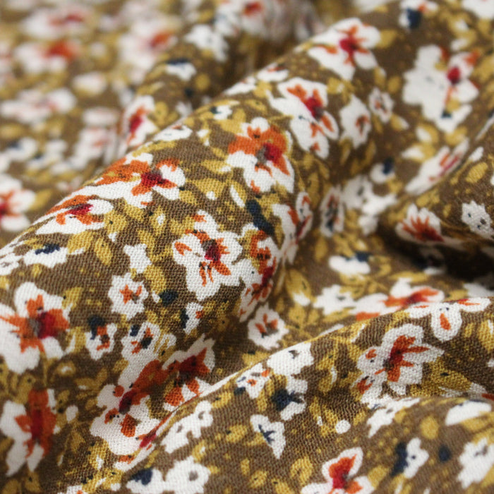 Tissu Viscose crêpe ocre fleuri blanc rouille noir - TissusPapi.com