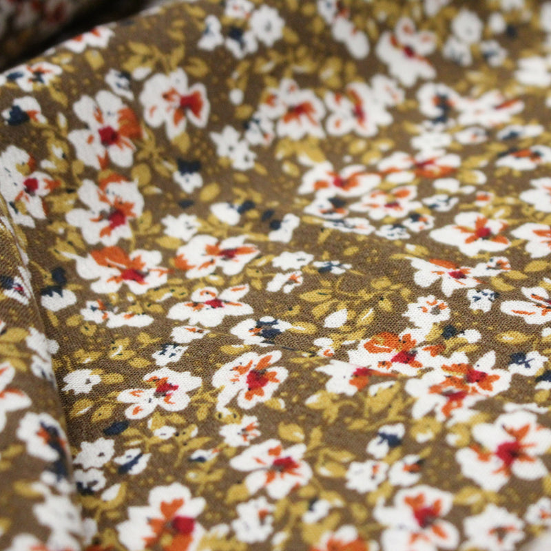 Tissu Viscose crêpe ocre fleuri blanc rouille noir - TissusPapi.com