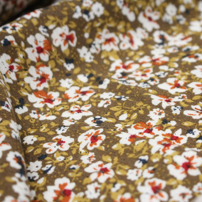 Tissu Viscose crêpe ocre fleuri blanc rouille noir - TissusPapi.com