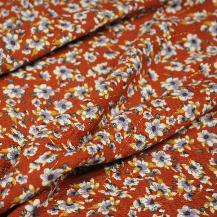 Tissu Viscose crêpe rouille, fleuri blanc & mauve et liserés lurex dorés - TissusPapi.com
