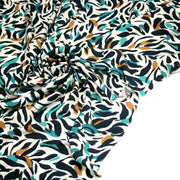 Tissu Viscose fluide au feuillage marine canard et ocre, fond écru - TissusPapi.com