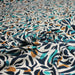 Tissu Viscose fluide au feuillage marine canard et ocre, fond écru - TissusPapi.com