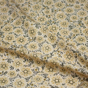 Tissu popeline coton ocre clair aux fleurs & fines arabesques noirs et jaunes - TissusPapi.com