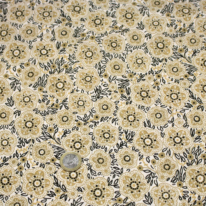 Tissu popeline coton ocre clair aux fleurs & fines arabesques noirs et jaunes - TissusPapi.com