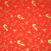 Tissu coton NOËL rouge aux houx et sucres d'orge dorés - OEKO - TEX - TissusPapi.com