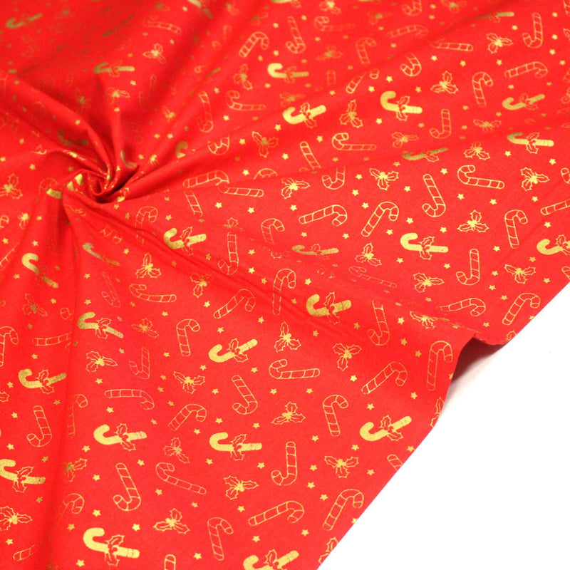 Tissu coton NOËL rouge aux houx et sucres d'orge dorés - OEKO - TEX - TissusPapi.com