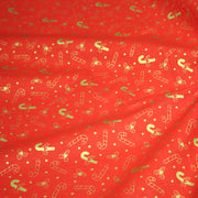 Tissu coton NOËL rouge aux houx et sucres d'orge dorés - OEKO - TEX - TissusPapi.com