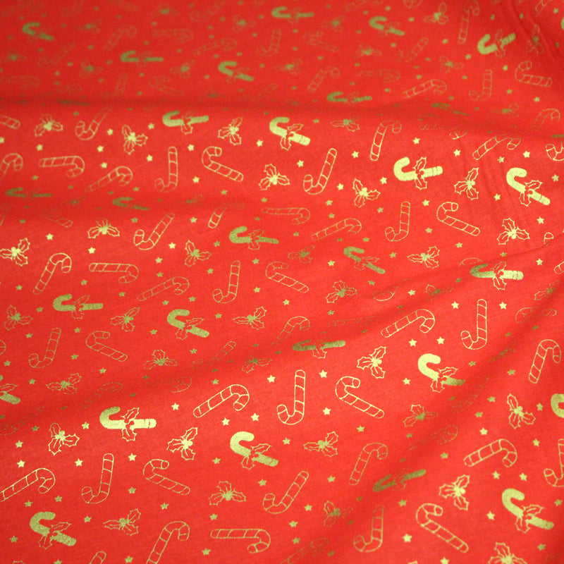 Tissu coton NOËL rouge aux houx et sucres d'orge dorés - OEKO - TEX - TissusPapi.com