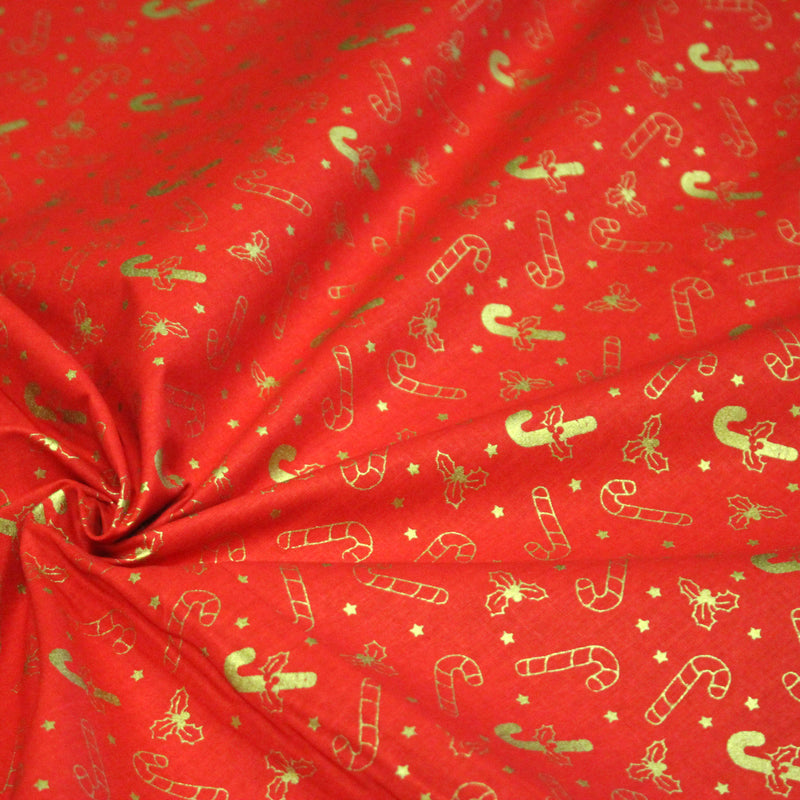 Tissu coton NOËL rouge aux houx et sucres d'orge dorés - OEKO - TEX - TissusPapi.com