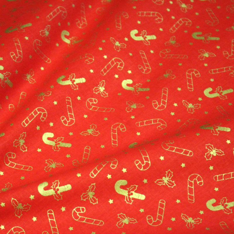 Tissu coton NOËL rouge aux houx et sucres d'orge dorés - OEKO - TEX - TissusPapi.com