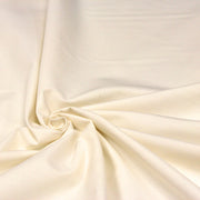 Tissu Satinette de coton blanc cassé, idéal en doublure de rideaux ! Disponible en 150 et 280cm de large - TissusPapi.com