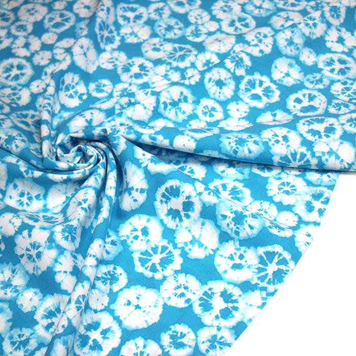 Tissu popeline de viscose motif tie-dye bleu turquoise - Fabrication française - OEKO-TEX