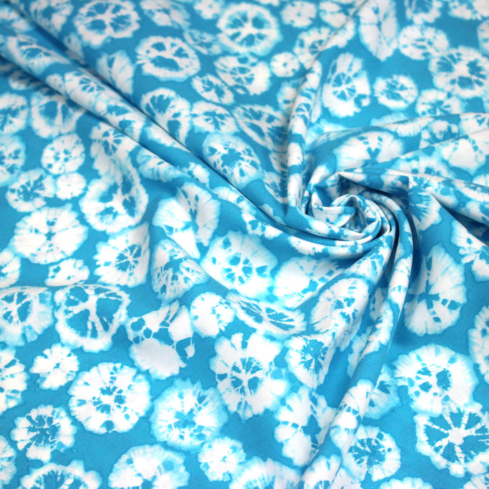 Tissu popeline de viscose motif tie-dye bleu turquoise - Fabrication française - OEKO-TEX