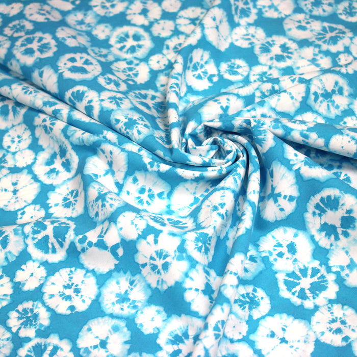 Tissu popeline de viscose motif tie-dye bleu turquoise - Fabrication française - OEKO-TEX