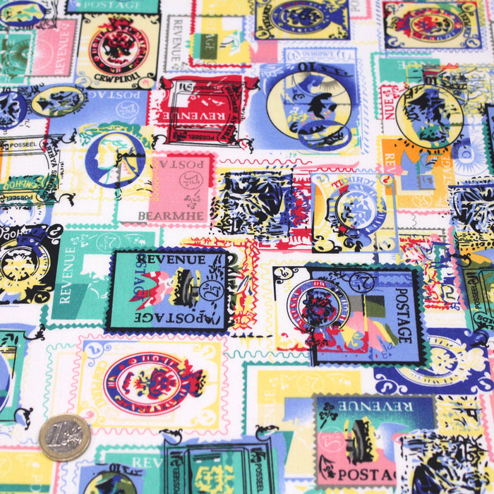 Tissu popeline de coton aux timbres multicolores, fond blanc
