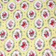 Tissu popeline jaune aux macarons fleuris britanniques - TissusPapi.com