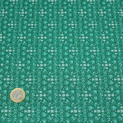 Tissu popeline de coton JADE, faux - uni aux fleurs vertes - TissusPapi.com