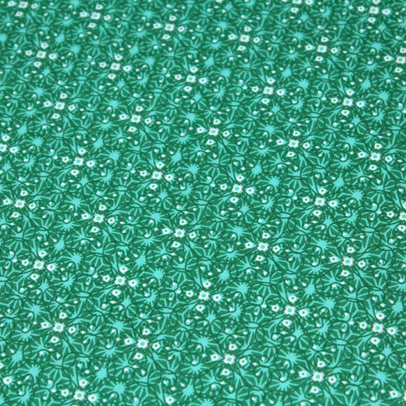 Tissu popeline de coton JADE, faux - uni aux fleurs vertes - TissusPapi.com