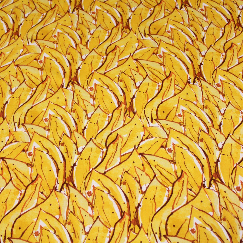 Tissu popeline de coton SUMATRA au feuillage tropical jaune, fond blanc - TissusPapi.com