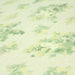 Tissu popeline de coton WIMBLEDON, fond nid d'abeille aux fleurs vert pistache - tissuspapi