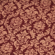 Tissu popeline de coton aux arabesques caramel, fond rouge bordeaux - COLLECTION LOUIS - TissusPapi.com