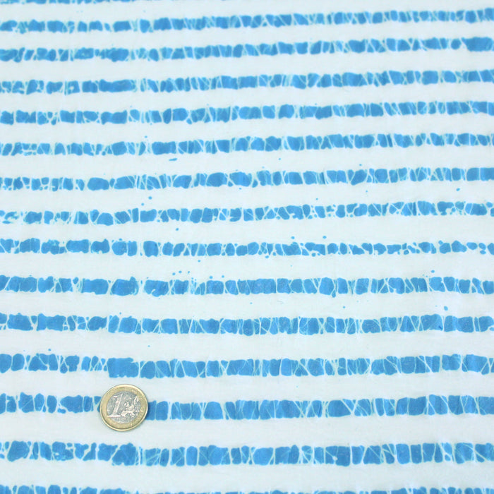 Tissu de coton batik gaufré à rayures bleu turquoise et blanches