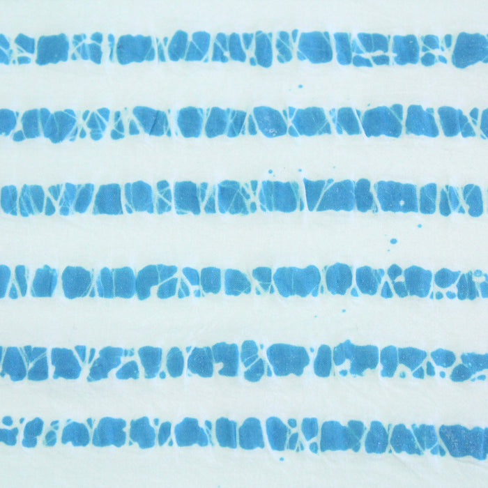 Tissu de coton batik gaufré à rayures bleu turquoise et blanches