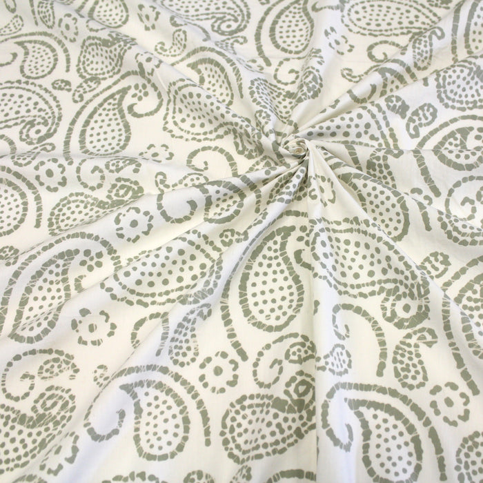 Tissu de coton Batik écru aux arabesques taupe clair