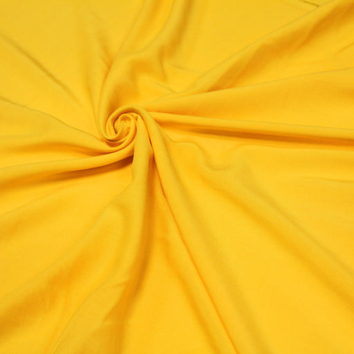 Tissu viscose fluide jaune bouton d'or - tissuspapi