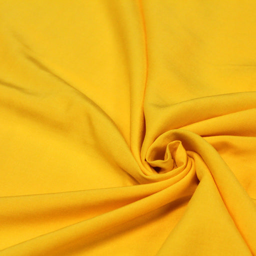 Tissu viscose fluide jaune bouton d'or
