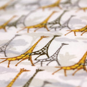 Tissu popeline de coton aux girafes jaunes & baobab, fond blanc - TissusPapi.com