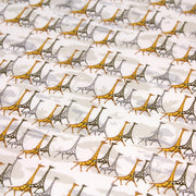 Tissu popeline de coton aux girafes jaunes & baobab, fond blanc - TissusPapi.com
