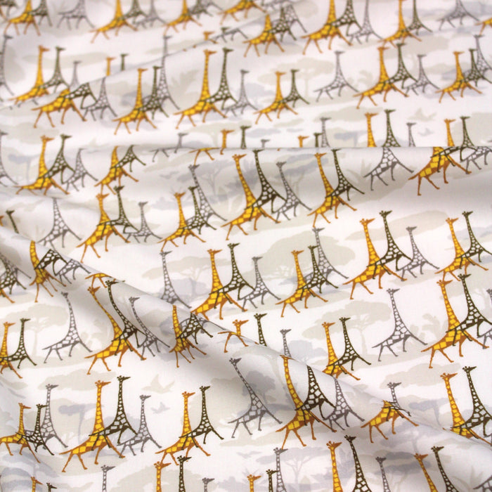 Tissu popeline de coton aux girafes jaunes & baobab, fond blanc - Oeko-Tex