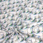 Tissu popeline de coton aux girafes bleues & baobab, fond blanc - TissusPapi.com