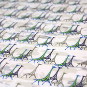 Tissu popeline de coton aux girafes bleues & baobab, fond blanc - TissusPapi.com